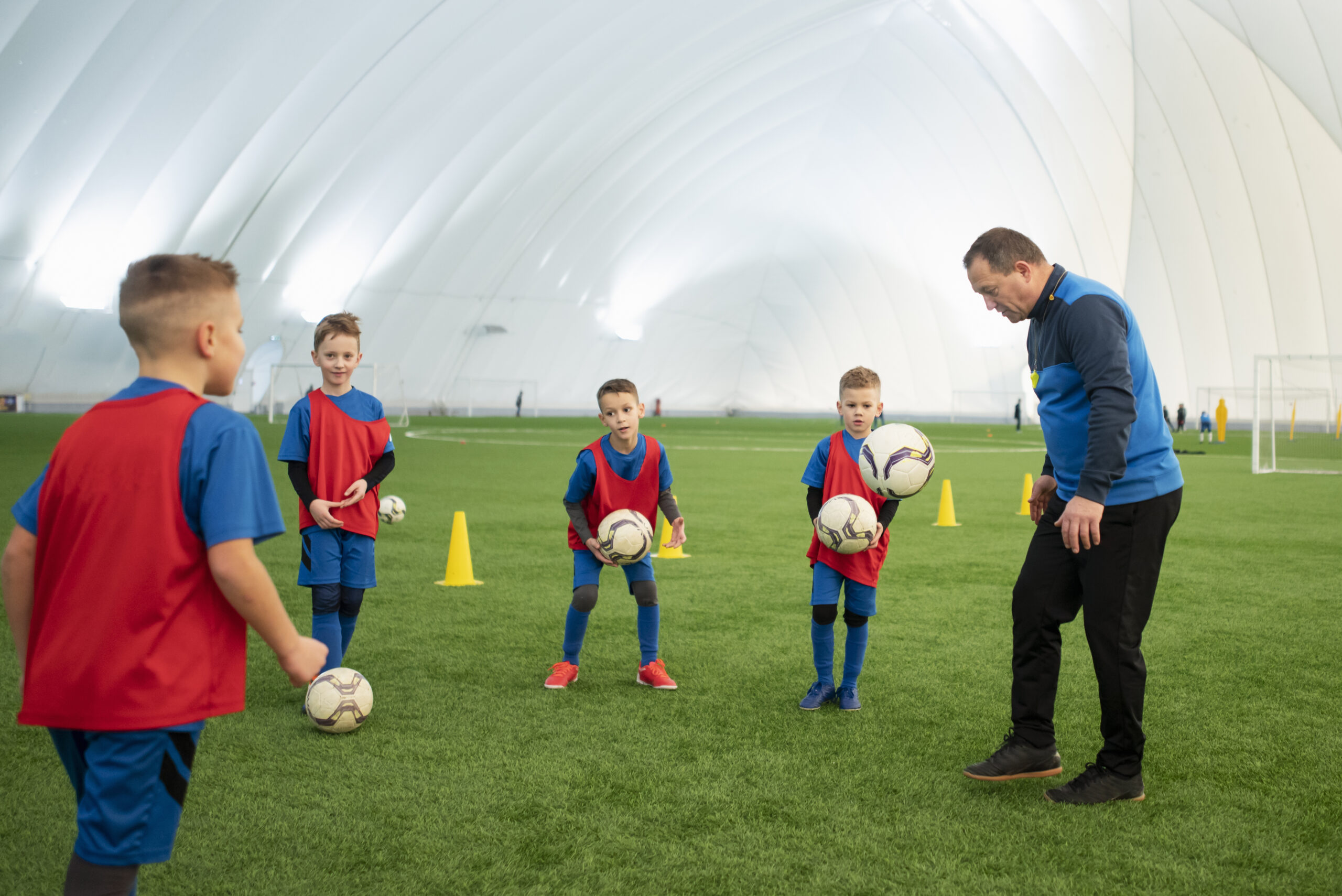 medium-shot-kids-playing-football